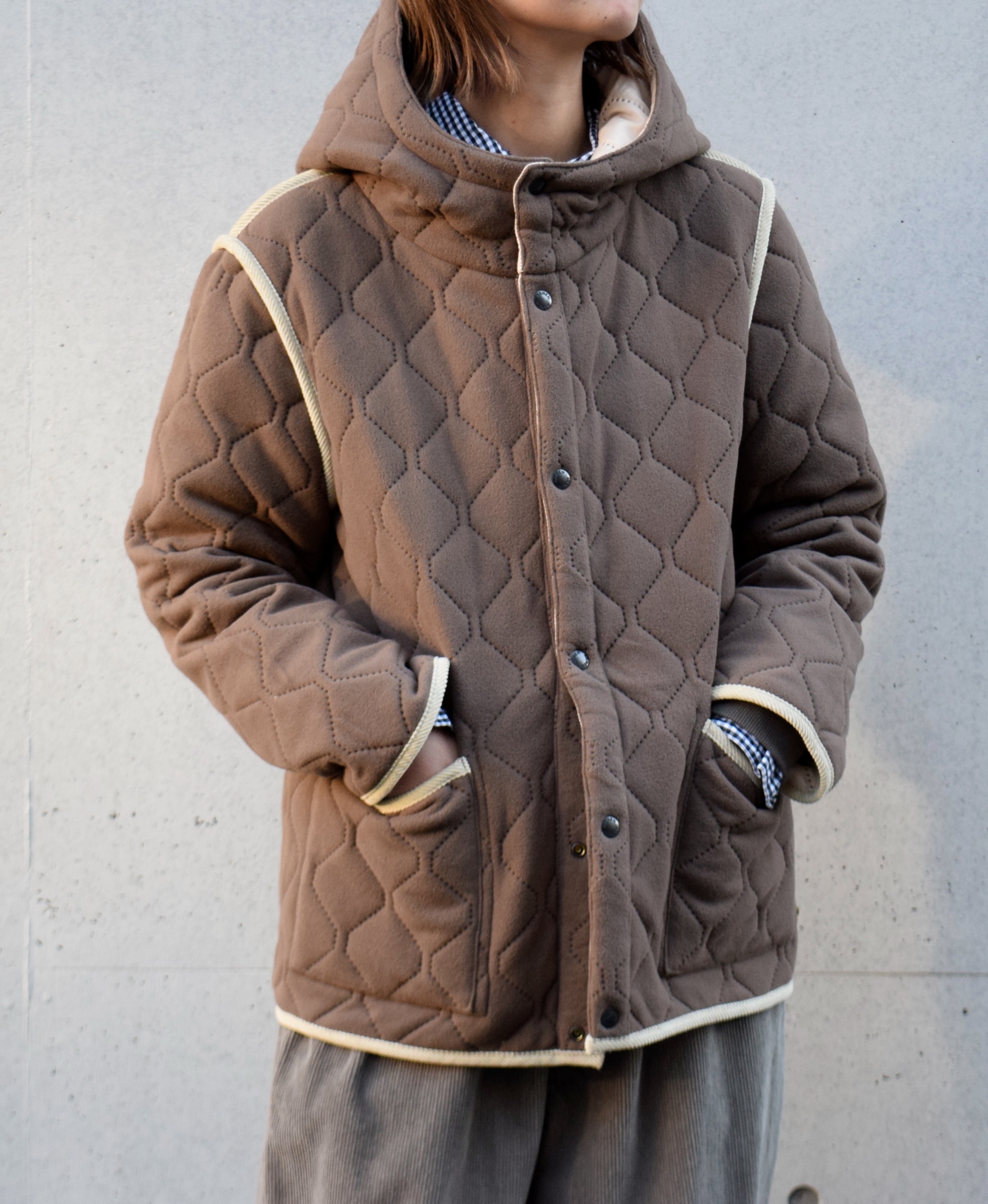 NAM1752 (ジャケット) POLYxFLEECE HEAT QUILT REVERSIBLE HIGH COLLAR HOODED JACKET