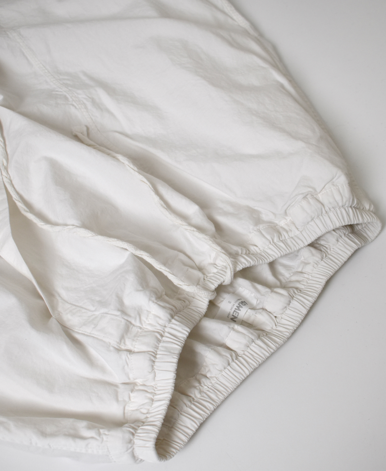 INAM2556PD(キュロット) 40s POPLIN OVER DYE WRAP CULOTTES WITH SEAM POCKET