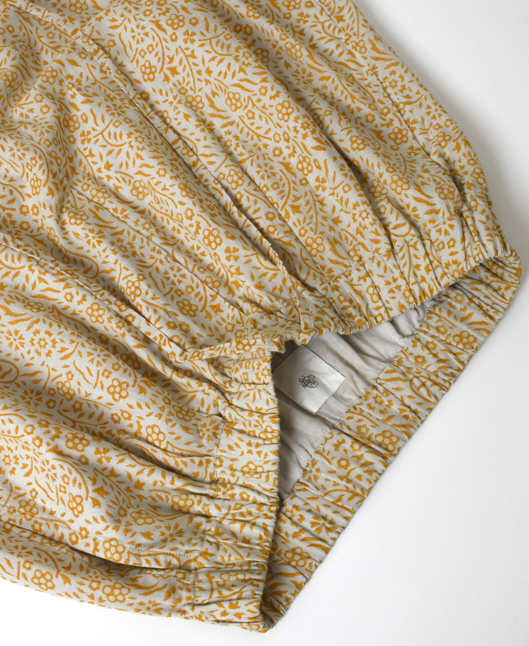 INMDS26106(パンツ) 80s COTTON FLOWER BLOCK PRINT 2TUCK TAPERED EASY PANTS